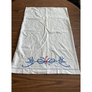 Set of two white pillowcases with embroidered birds and flowers
